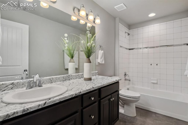 1632 Derbyshire St, Colorado Springs, CO 80910 - bathroom with tile patterned flooring, vanity, shower / bath combination, toilet, and visible vents