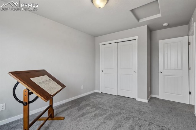 1632 Derbyshire St, Colorado Springs, CO 80910 - interior space with baseboards, carpet, and attic access