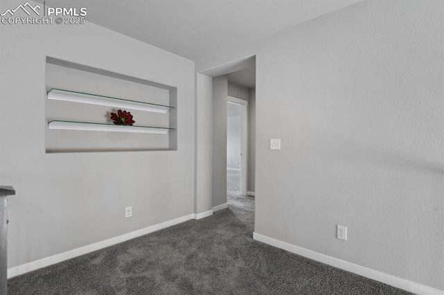 1632 Derbyshire St, Colorado Springs, CO 80910 - spare room featuring baseboards and dark colored carpet