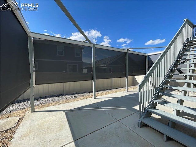 1632 Derbyshire St, Colorado Springs, CO 80910 - view of patio featuring stairway and a lanai