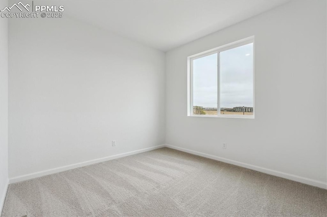 2489 Vanhoutte Vw, Colorado Springs, CO 80915 - carpeted empty room featuring baseboards