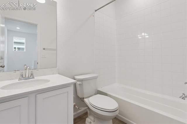 2489 Vanhoutte Vw, Colorado Springs, CO 80915 - bathroom with toilet, vanity, and shower / tub combination