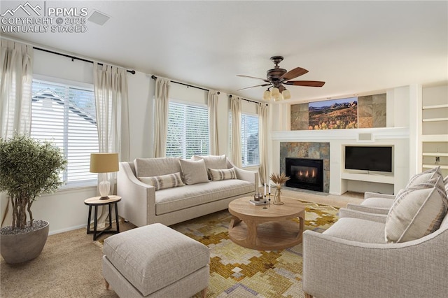 4730 Jenson Ln, Colorado Springs, CO 80922 - living room with healthy amount of natural light, ceiling fan, and baseboards