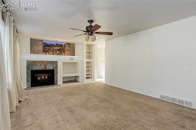 4730 Jenson Ln, Colorado Springs, CO 80922 - unfurnished living room featuring carpet, a fireplace, ceiling fan, and baseboards
