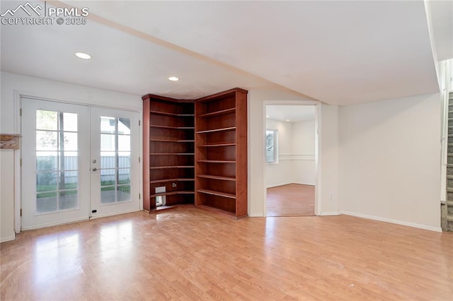 4730 Jenson Ln, Colorado Springs, CO 80922 - empty room with french doors, light wood finished floors, baseboards, and recessed lighting