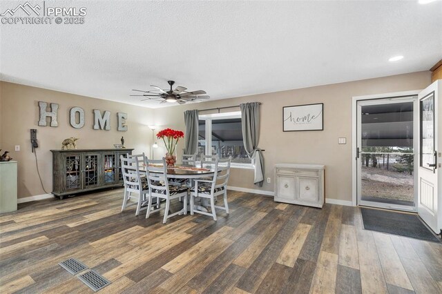 6770 Gun Club Trl, Colorado Springs, CO 80908 - dining space featuring baseboards, wood finished floors, a textured ceiling, and ceiling fan