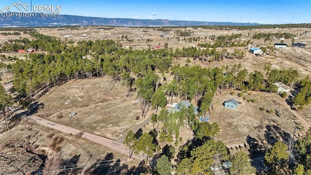 6770 Gun Club Trl, Colorado Springs, CO 80908 - aerial view featuring a rural view and a mountain view