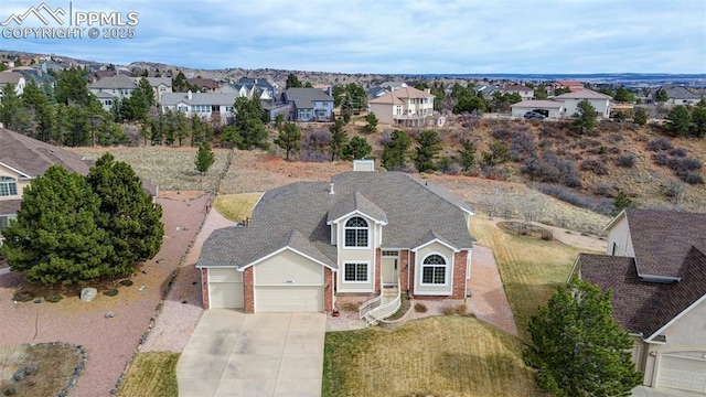 bird's eye view with a residential view