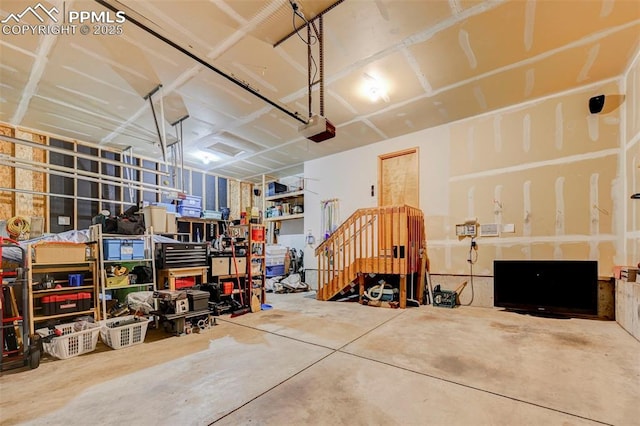 garage featuring a garage door opener