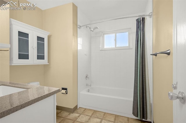 3781 Red Cedar Dr, Colorado Springs, CO 80906 - full bath featuring baseboards, shower / bath combo with shower curtain, and vanity