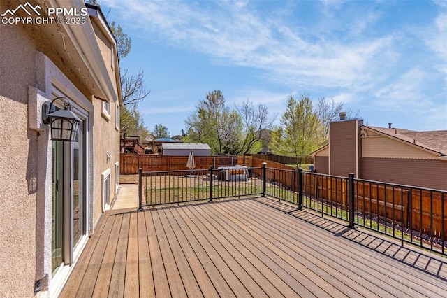 3781 Red Cedar Dr, Colorado Springs, CO 80906 - wooden deck with a fenced backyard