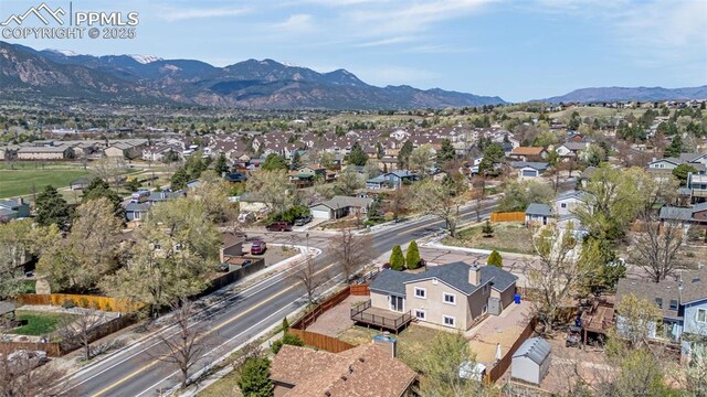 3781 Red Cedar Dr, Colorado Springs, CO 80906 - aerial view with a mountain view and a residential view
