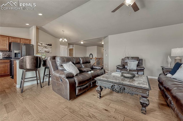 9812 Fairway Glen Dr, Peyton, CO 80831 - living room with light wood-type flooring, lofted ceiling, baseboards, ceiling fan with notable chandelier, and recessed lighting