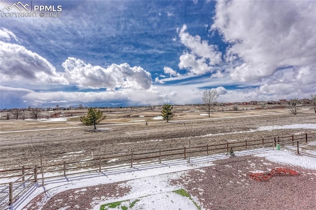 9812 Fairway Glen Dr, Peyton, CO 80831 - yard layered in snow featuring fence and a rural view