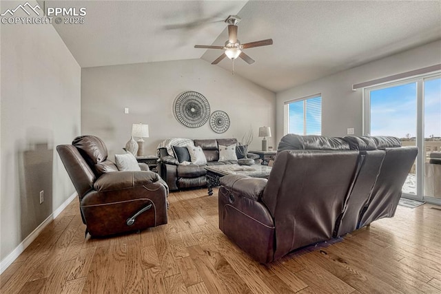 9812 Fairway Glen Dr, Peyton, CO 80831 - living area featuring baseboards, vaulted ceiling, light wood-style floors, and ceiling fan