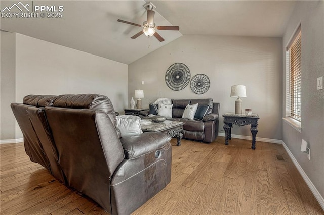 9812 Fairway Glen Dr, Peyton, CO 80831 - living room with lofted ceiling, light wood-type flooring, baseboards, visible vents, and ceiling fan