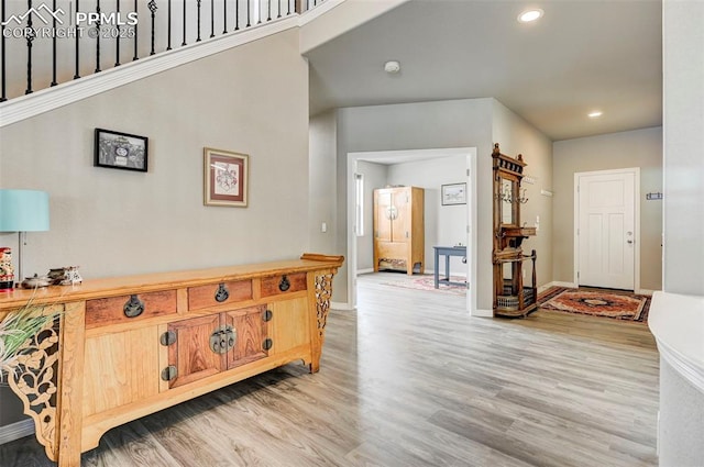 10790 Rolling Peaks Dr, Peyton, CO 80831 - entryway featuring baseboards, light wood-style floors, and recessed lighting