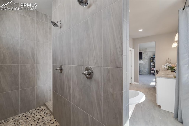 10790 Rolling Peaks Dr, Peyton, CO 80831 - bathroom with vanity and tiled shower