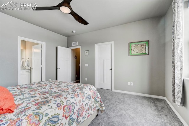 10790 Rolling Peaks Dr, Peyton, CO 80831 - carpeted bedroom featuring baseboards, visible vents, ensuite bath, and a ceiling fan