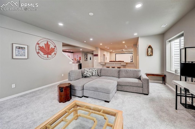 10790 Rolling Peaks Dr, Peyton, CO 80831 - carpeted living room with baseboards and recessed lighting
