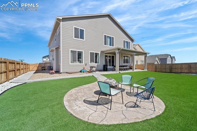 10790 Rolling Peaks Dr, Peyton, CO 80831 - back of property featuring a fenced backyard, a lawn, cooling unit, and a patio area