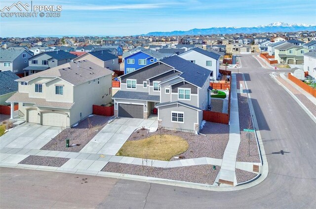 10790 Rolling Peaks Dr, Peyton, CO 80831 - aerial view with a residential view and a mountain view