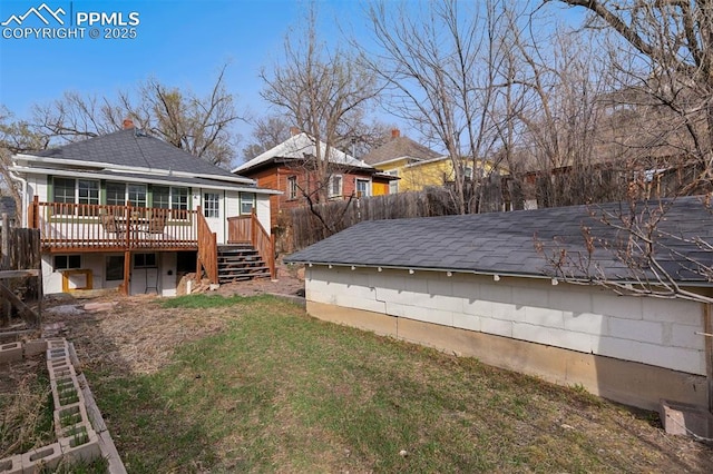 2721 W Bijou St, Colorado Springs, CO 80904 - back of house featuring a wooden deck, stairway, and a shingled roof
