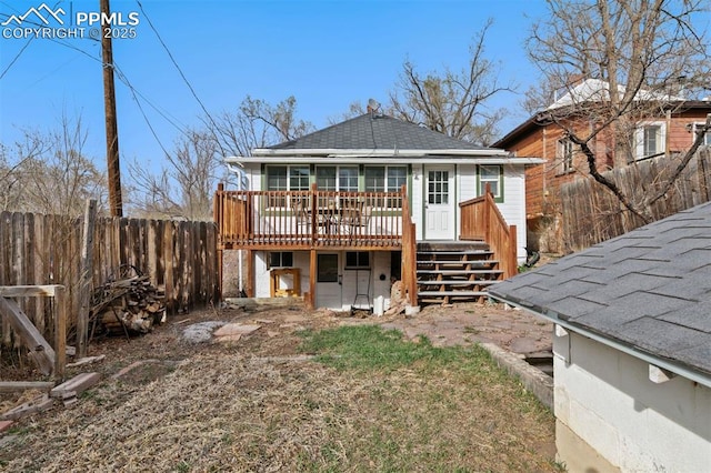 2721 W Bijou St, Colorado Springs, CO 80904 - rear view of property with a deck, a shingled roof, and stairs