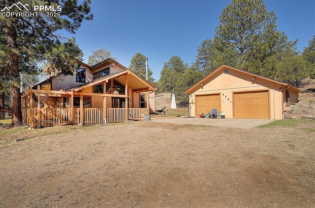 5581 County Road 328, Westcliffe, CO 81252 - view of front facade featuring a garage and dirt driveway