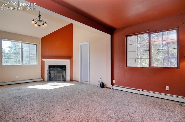 5581 County Road 328, Westcliffe, CO 81252 - unfurnished living room featuring a baseboard heating unit, an inviting chandelier, carpet flooring, and lofted ceiling