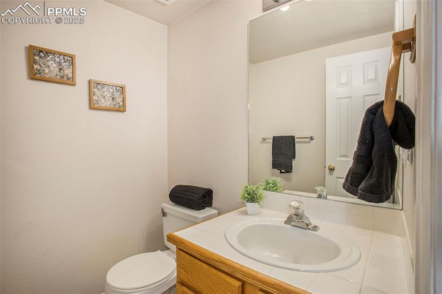 3272 Capstan Way, Colorado Springs, CO 80906 - half bathroom featuring toilet and vanity