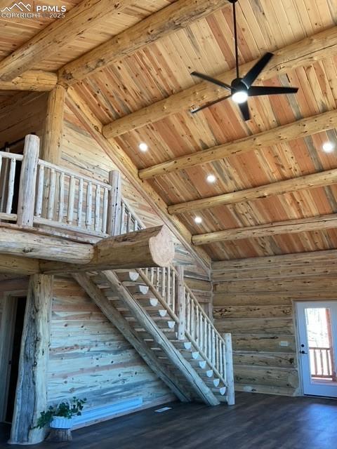 1906 Korlkoff Ln, Fort Garland, CO 81133 - stairs with ceiling fan, wood finished floors, wooden ceiling, and vaulted ceiling with beams
