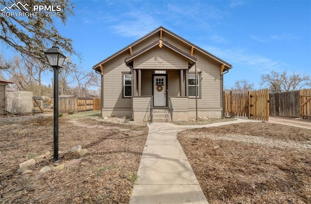 3010 W Kiowa St, Colorado Springs, CO 80904 - bungalow with a gate and fence