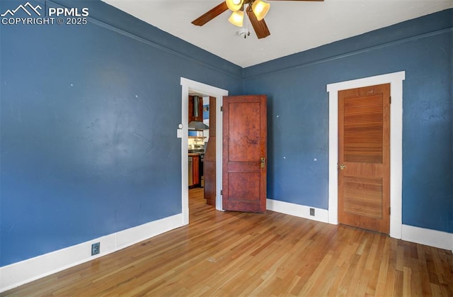 3010 W Kiowa St, Colorado Springs, CO 80904 - empty room featuring baseboards, wood finished floors, and a ceiling fan