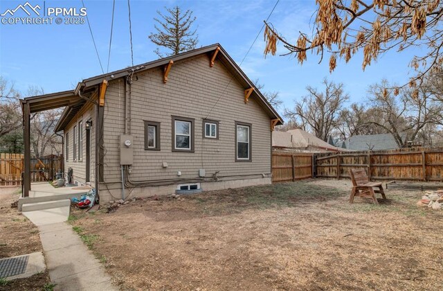 3010 W Kiowa St, Colorado Springs, CO 80904 - back of house featuring a fenced backyard