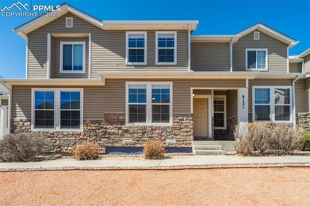 view of front of house featuring stone siding