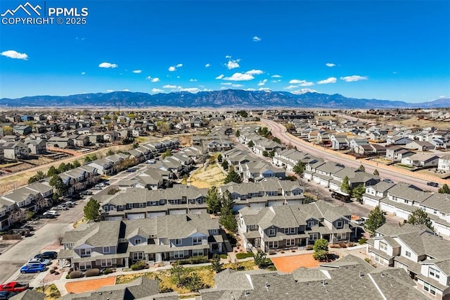 bird's eye view with a residential view and a mountain view