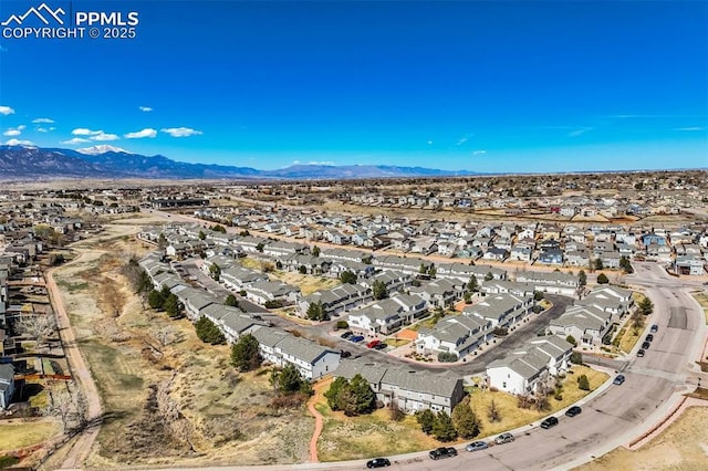 bird's eye view featuring a residential view and a mountain view