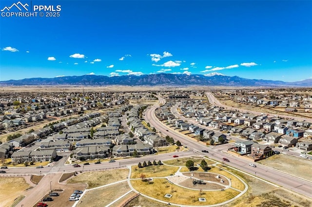 birds eye view of property featuring a residential view and a mountain view