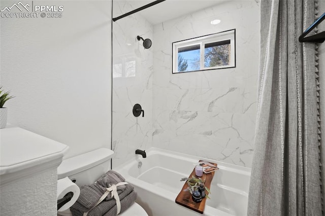 full bathroom with toilet and shower / bath combo with shower curtain