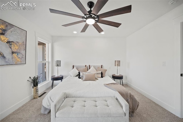 carpeted bedroom featuring a ceiling fan, baseboards, and recessed lighting