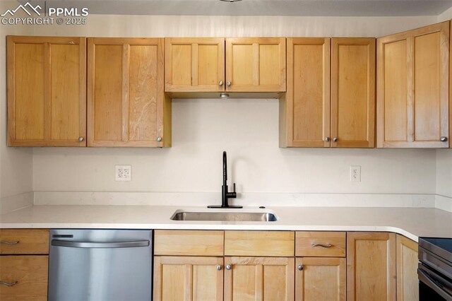 2118 S El Paso Ave, Colorado Springs, CO 80905 - kitchen featuring light countertops, a sink, and stainless steel dishwasher