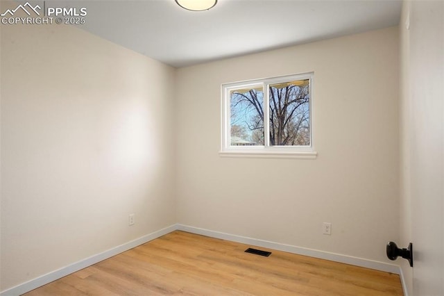 2118 S El Paso Ave, Colorado Springs, CO 80905 - spare room featuring light wood-style flooring, baseboards, and visible vents