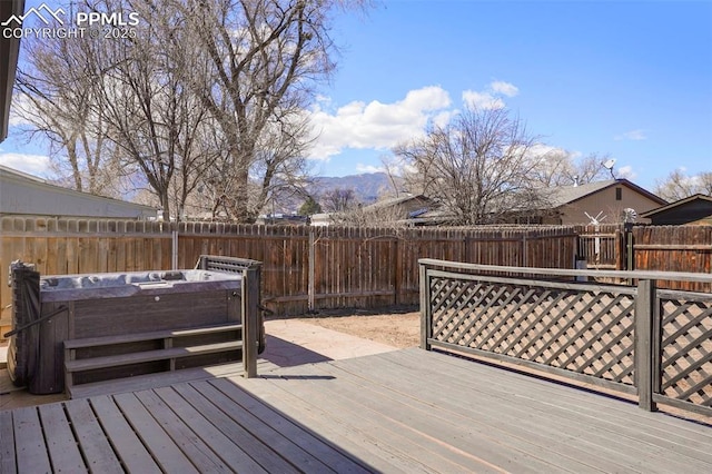 2118 S El Paso Ave, Colorado Springs, CO 80905 - wooden deck with a hot tub and a fenced backyard