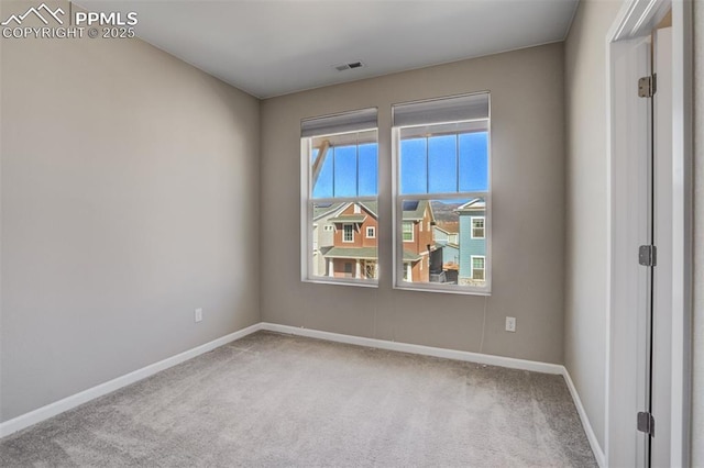 1341 Solitaire St, Colorado Springs, CO 80905 - empty room featuring baseboards, carpet floors, and visible vents