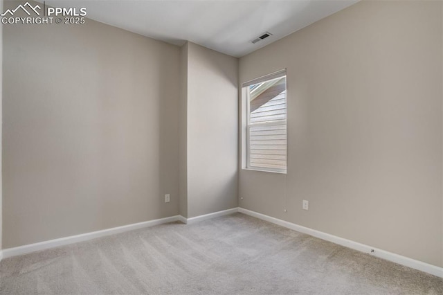 1341 Solitaire St, Colorado Springs, CO 80905 - unfurnished room with carpet floors, baseboards, and visible vents