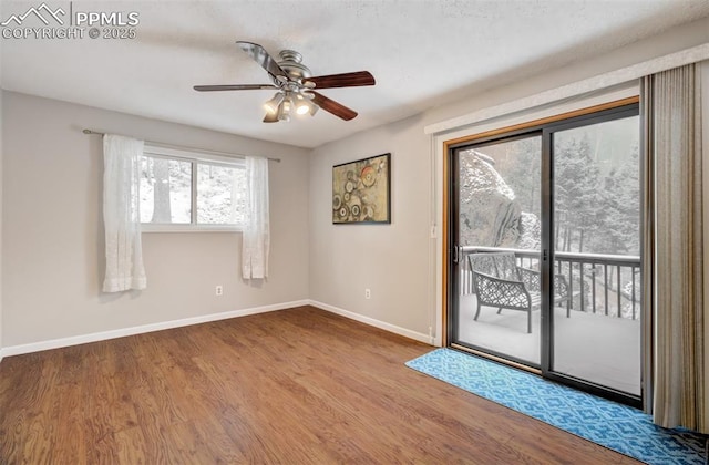 5865 Waterfall Loop, Manitou Springs, CO 80829 - unfurnished room with baseboards, ceiling fan, and wood finished floors