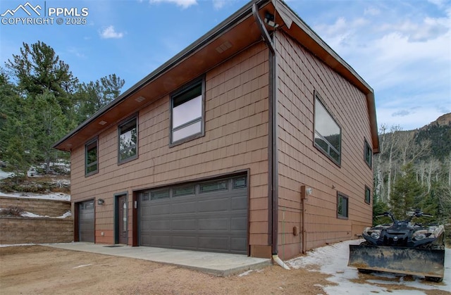 5865 Waterfall Loop, Manitou Springs, CO 80829 - view of property exterior with an attached garage