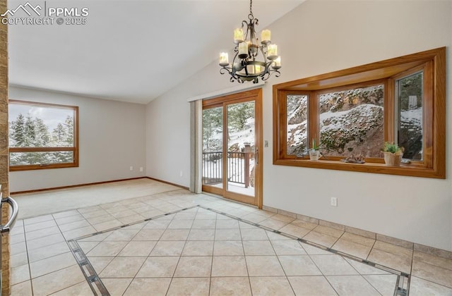 5865 Waterfall Loop, Manitou Springs, CO 80829 - empty room featuring baseboards, lofted ceiling, a chandelier, and light tile patterned floors