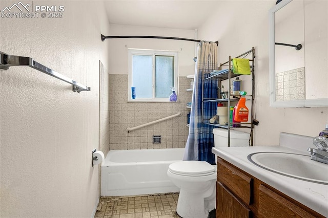 bathroom featuring toilet, vanity, and shower / tub combo with curtain